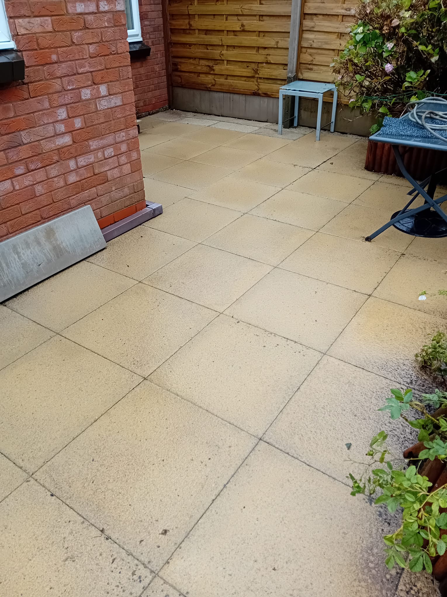 After pressure washing of patio
